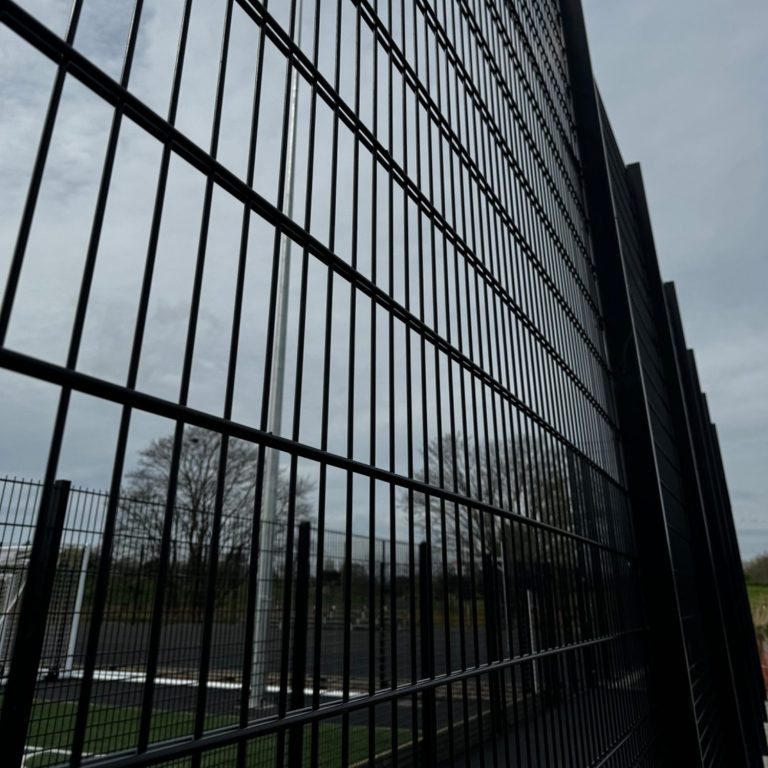 Security fencing installation on a commercial construction site